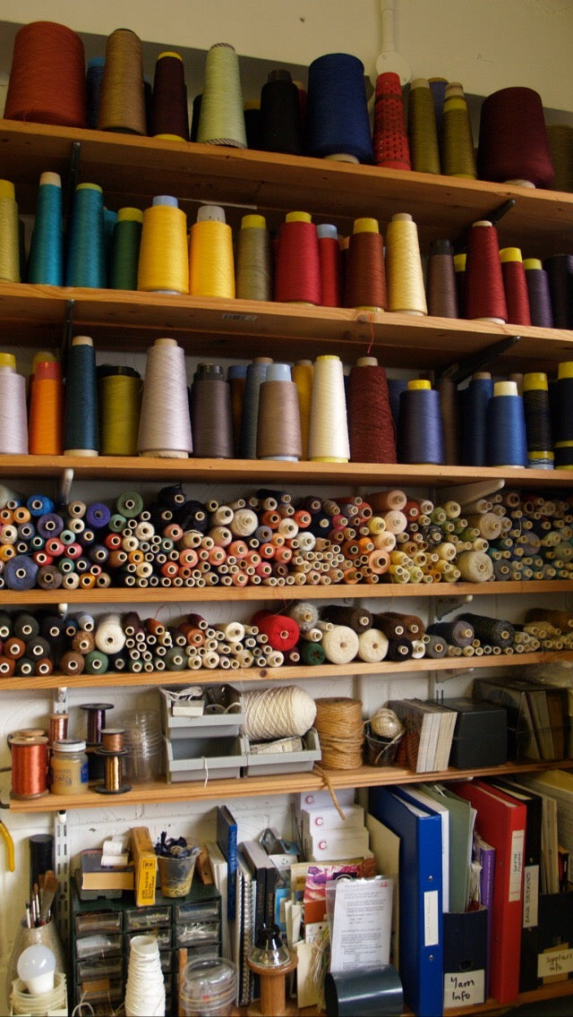 Image of an array of colour yarns in Charlotte's studio